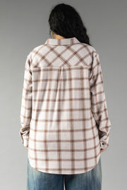 A person with long dark hair, seen from behind against a plain gray background, is wearing the Panache Apparel Collection Light Taupe & Brown Plaid Button Up paired with blue jeans.