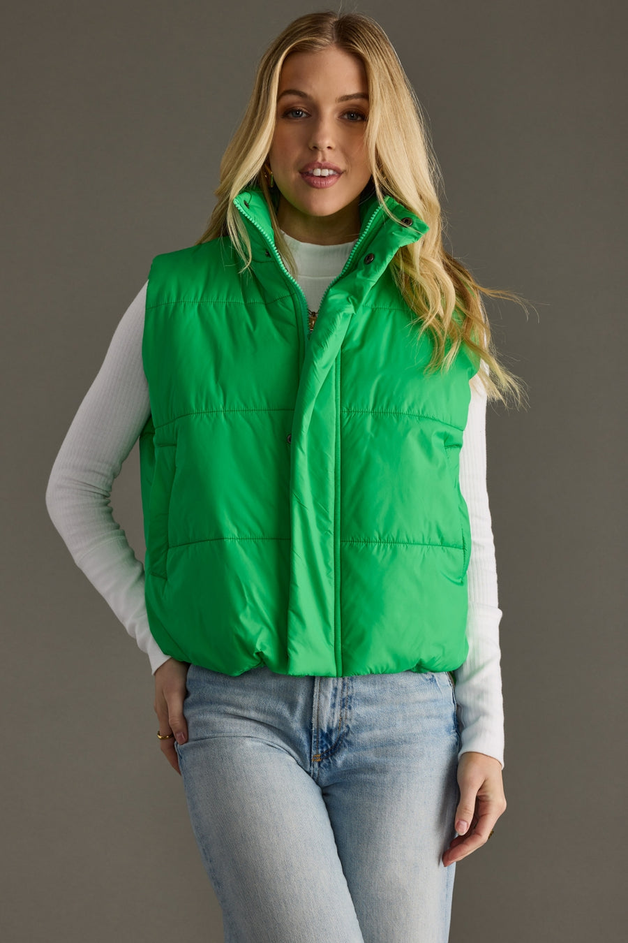 Front view of Panache Apparel’s Bright Green World Traveler Vest featuring a high stand collar and zip closure.