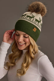 Panache Apparel Collection Olive & Beige Deer Patterned Pom Hat in olive and beige, featuring a deer pattern, fleece lining, and a large faux fur pom-pom.