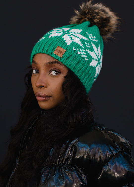 printed green winter hat with pom