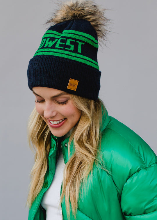 womens navy and green pom hat