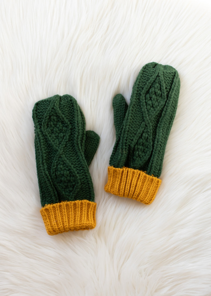 Flat lay of Panache Apparel’s green and gold trim cable knit mittens.