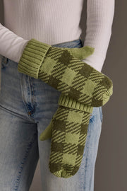 A person wearing light blue jeans, a white ribbed long-sleeve shirt, and the Panache Apparel Collection Light Green & Olive Plaid Knit Mittens, standing against a neutral background.