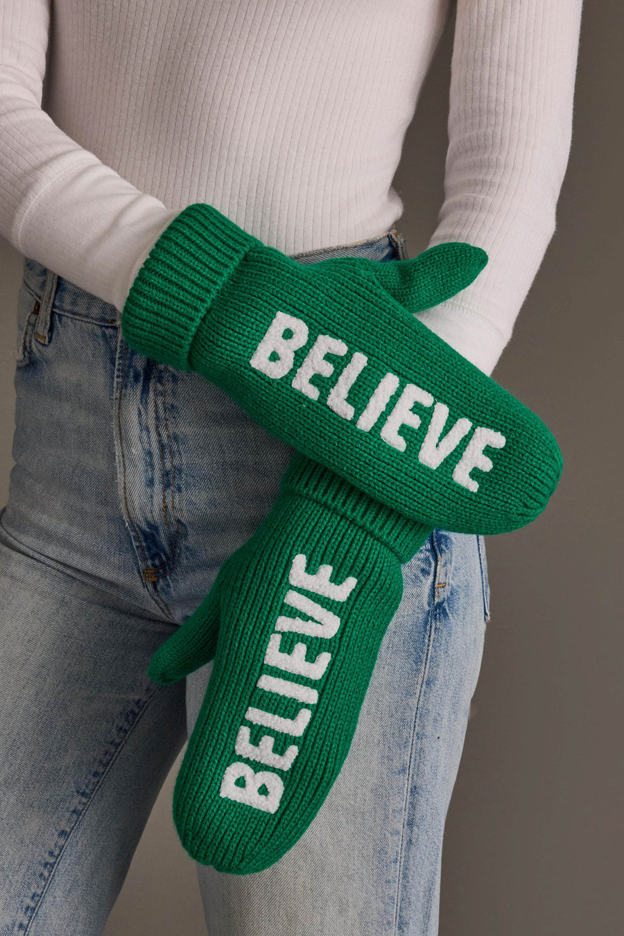 Green Believe Knit Mittens from Panache Apparel Collection: green acrylic knit mittens with the word BELIEVE stitched in white on the back of each hand.