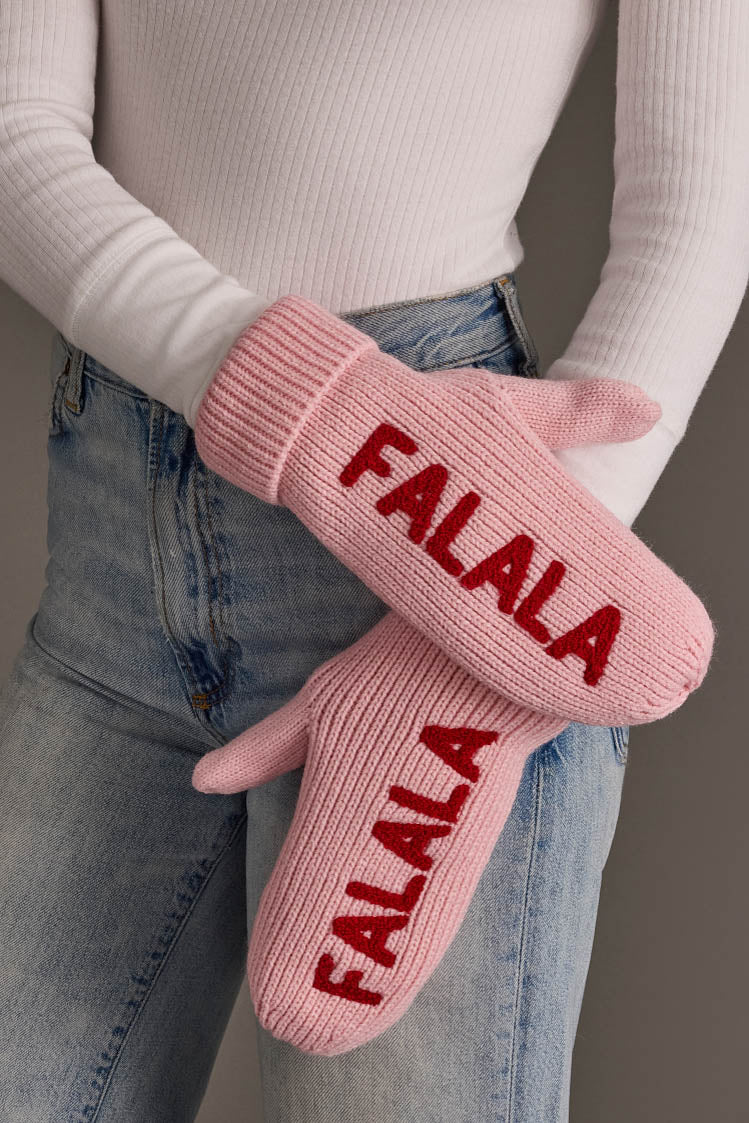 Pink Fa La La Knit Mittens featuring the word FALALA in red letters on each.