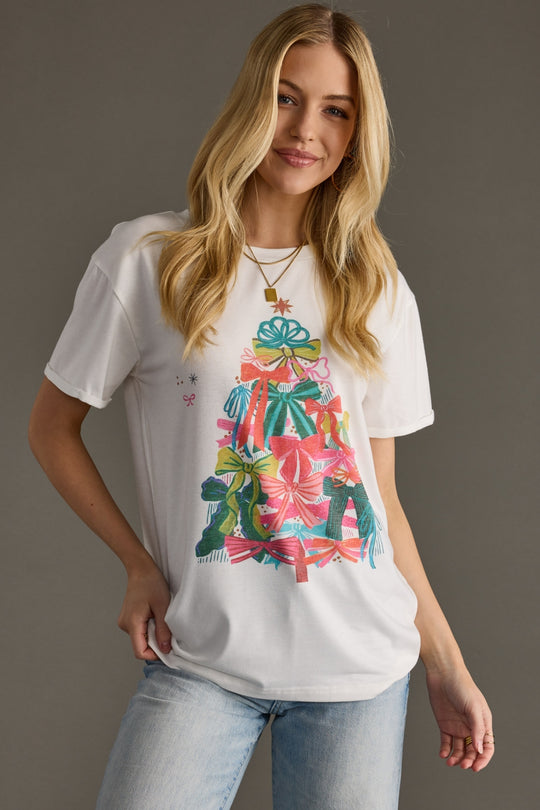 white graphic t-shirt with Christmas tree bow design on the front
