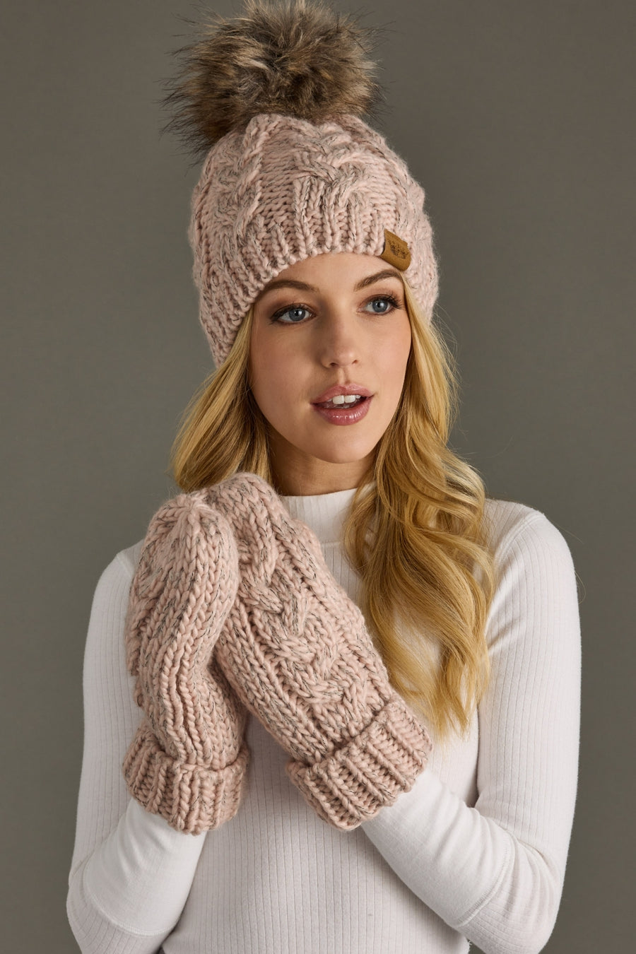 Blush cable knit pom hat