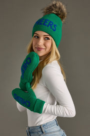 Woman wearing a green beanie and gloves with 'CHEERS' text on a gray background
