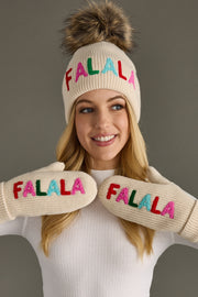 Person wearing a cream beanie and mittens with 'FALALA' text on a gray background