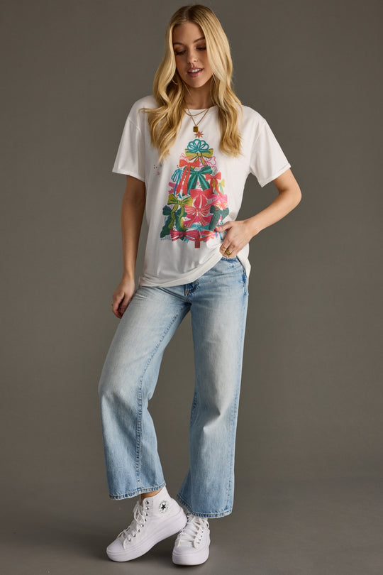 white graphic t-shirt with Christmas tree bow design on the front