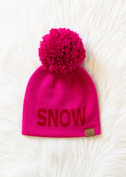 Pink beanie with a pom-pom and 'SNOW' text on a white background