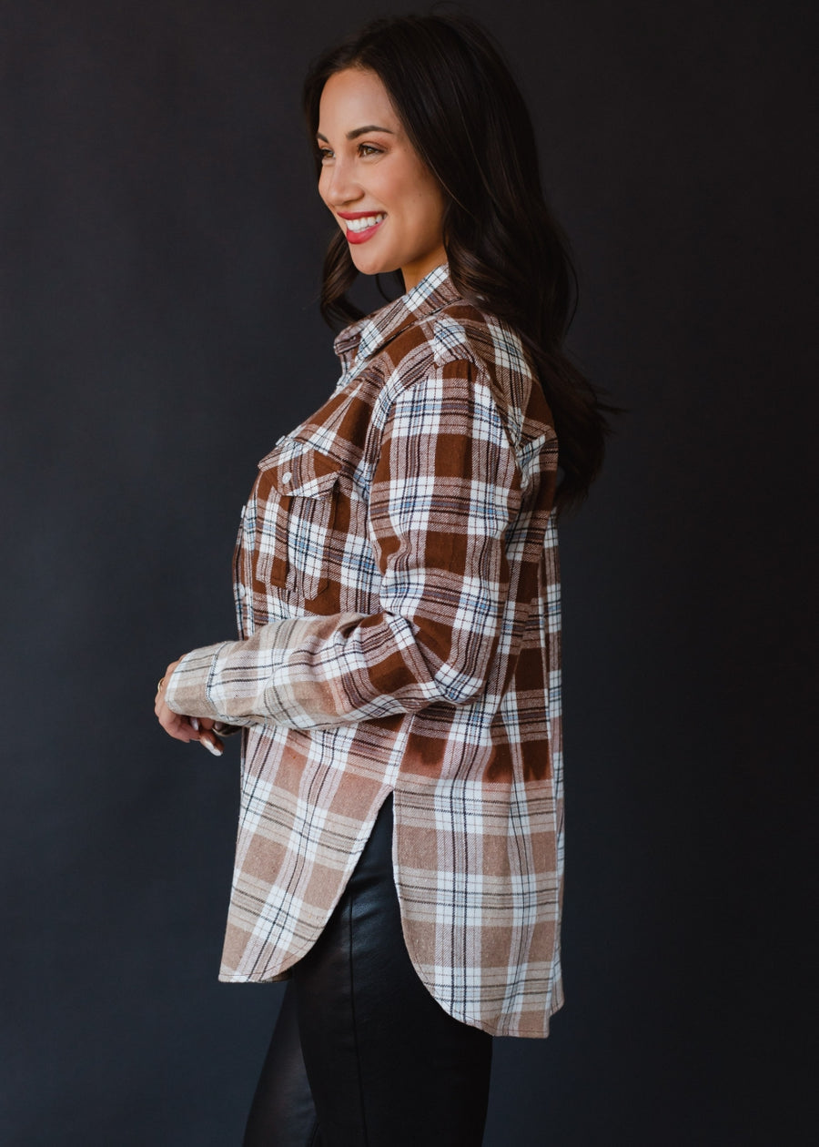 brown, black, blue and white plaid flannel