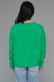 green and yellow apres sweater, apres sweater, green sweater, ski sweater, women's sweater