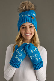 Woman wearing a blue knit hat and mittens with text on a gray background